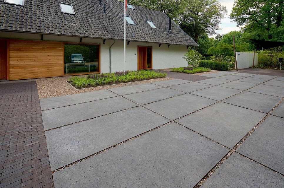 Welke tuintegels kan ik het beste kiezen in mijn tuin?